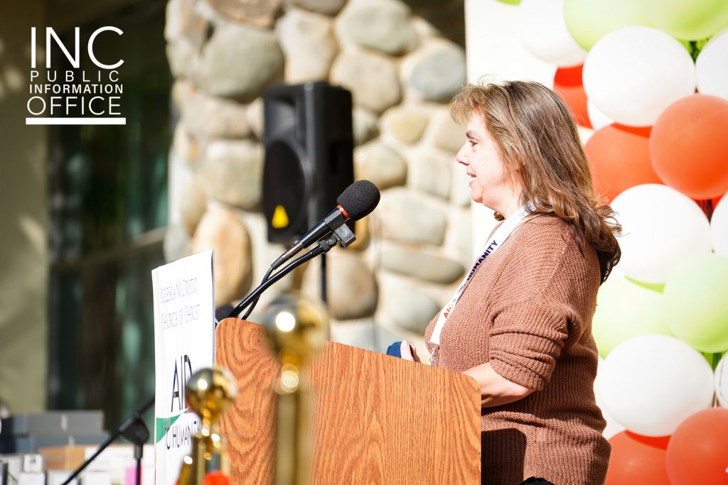 Rachel Cauteruccio, President of the Terra Nova Education Foundation, accepts a $10,000 donation and dozens of Chromebooks in past Aid To Humanity event of FYM Foundation.