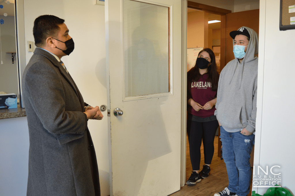 2.	A minister from the Iglesia Ni Cristo (Church Of Christ) speaks with employees at the Lloydminster Men’s Shelter while distributing a portion of the 550 plus care packages donated from their Aid To Humanity Project.