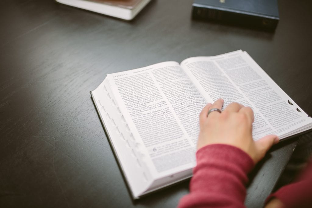 3. An open bible on a table