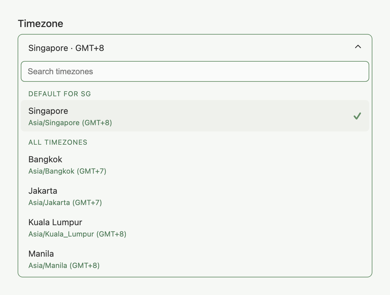 Timezone dropdown open, showing the DEFAULT FOR SG and ALL TIMEZONES groups with a search box