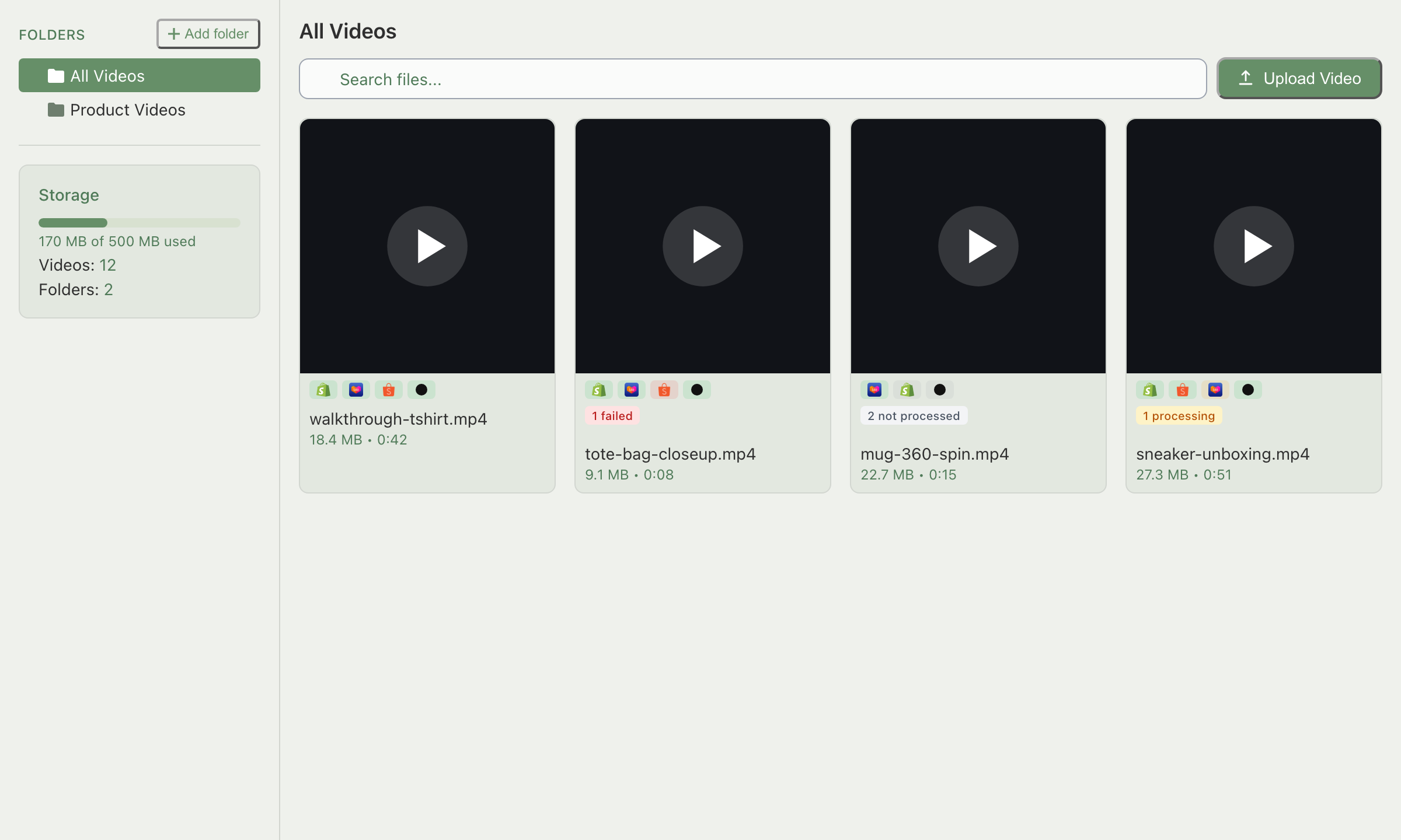 Media Center, Videos tab, grid and toolbar with the Upload Video button visible, tiles showing a mix of status badges