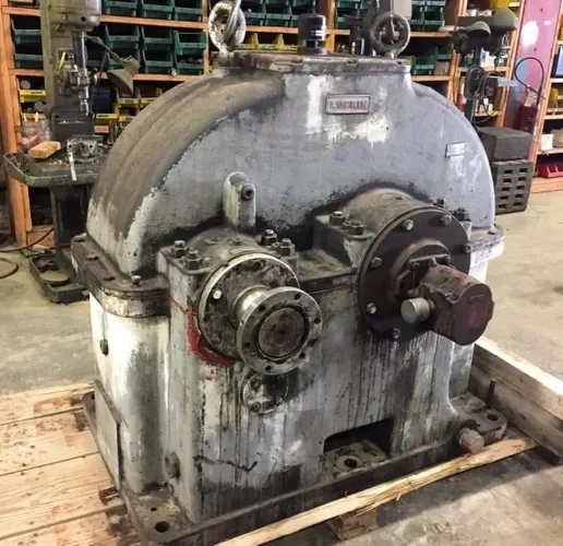 How do surface coatings impact the noise levels produced by gearboxes during operation?