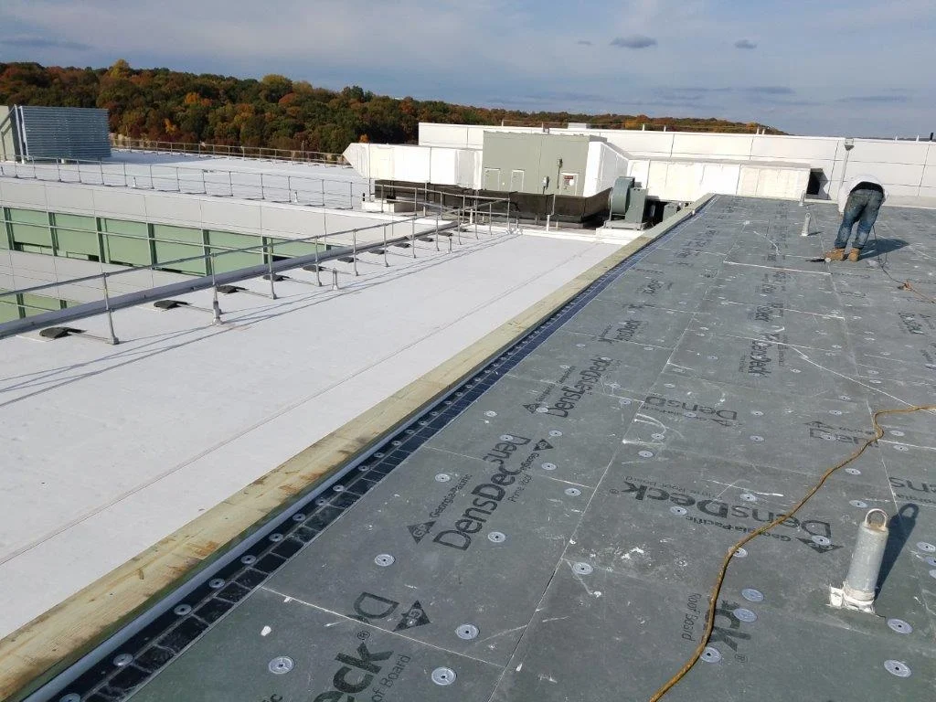 EPDM and TPO commercial roofing materials installed by All-Star Roofing Inc. in Amity Harbor, NY