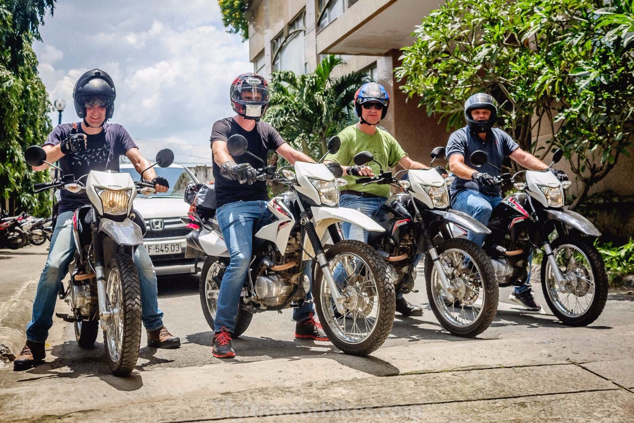 Riders posing by their motorbikes offered by TIGIT