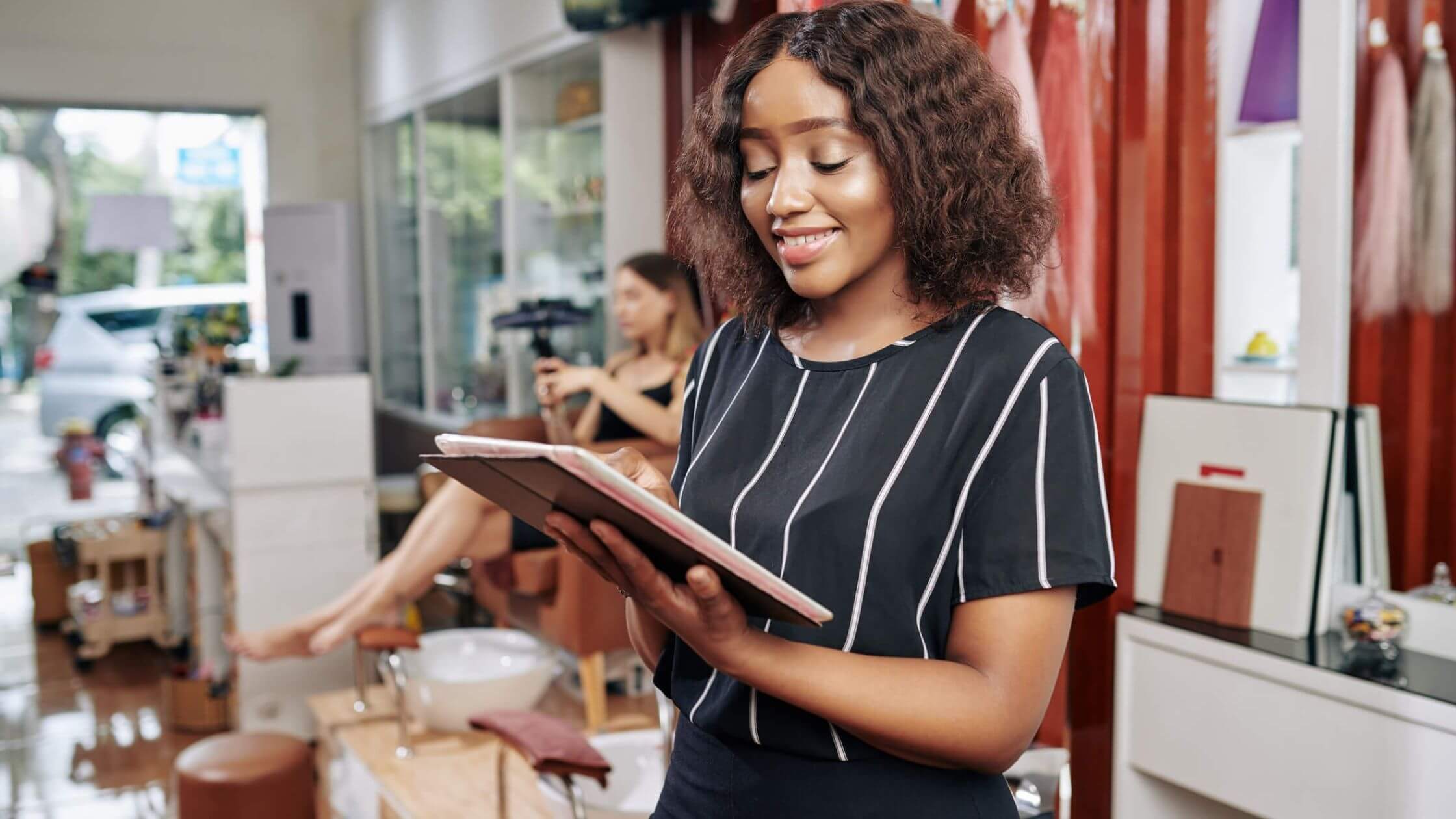 A franchisee reviews a franchisor's training manual.