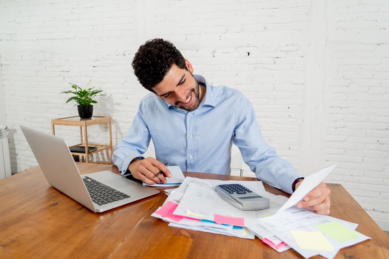 A small business owner fills out an SBA loan application. 