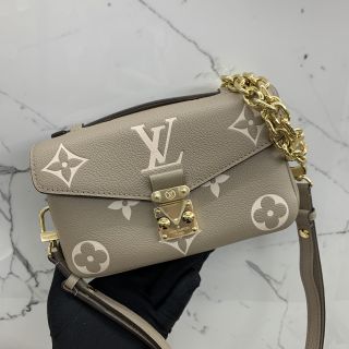 M23081 POCHETTE METIS EAST WEST