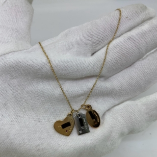 TIFFANY FINE JEWELRY AU750 CHARM NECKLACE 8.3G