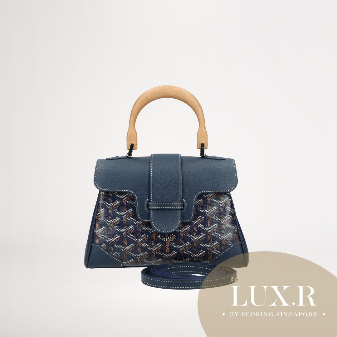 Crafted from iconic Goyard monogram canvas, the Belvedere is the