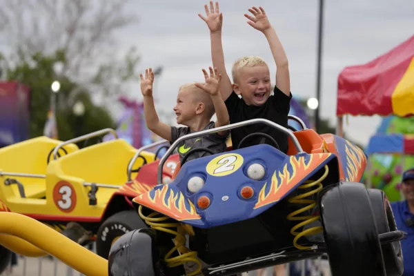 Little boys enjoying Thrill Parks rides