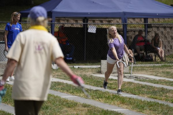 Horseshoe pitching east of Pioneer Hall