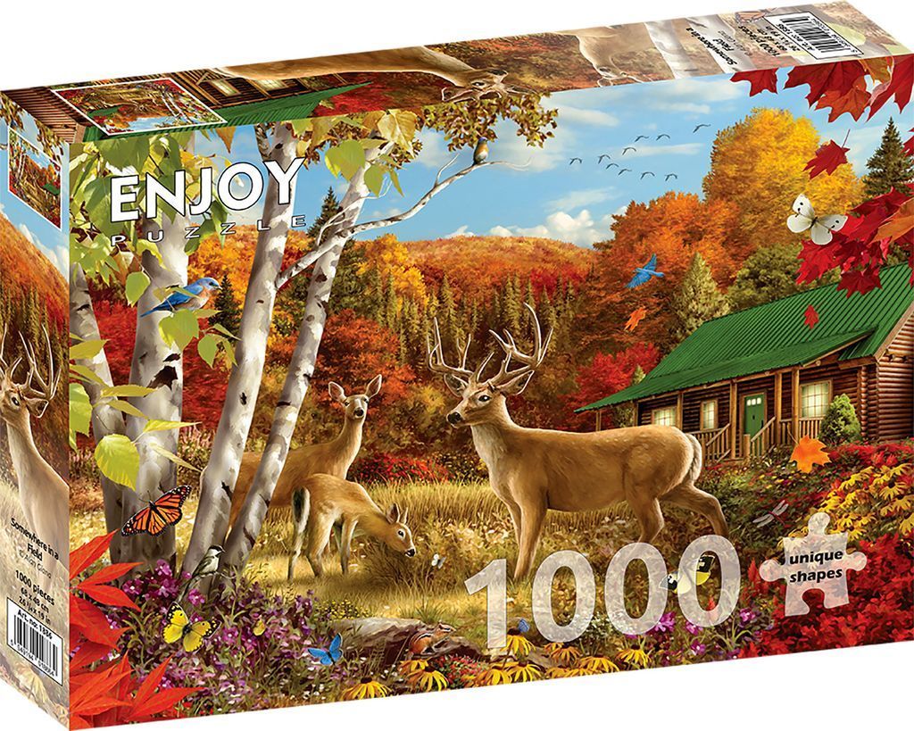 A scenic autumn landscape with deer in a field near a log cabin.
