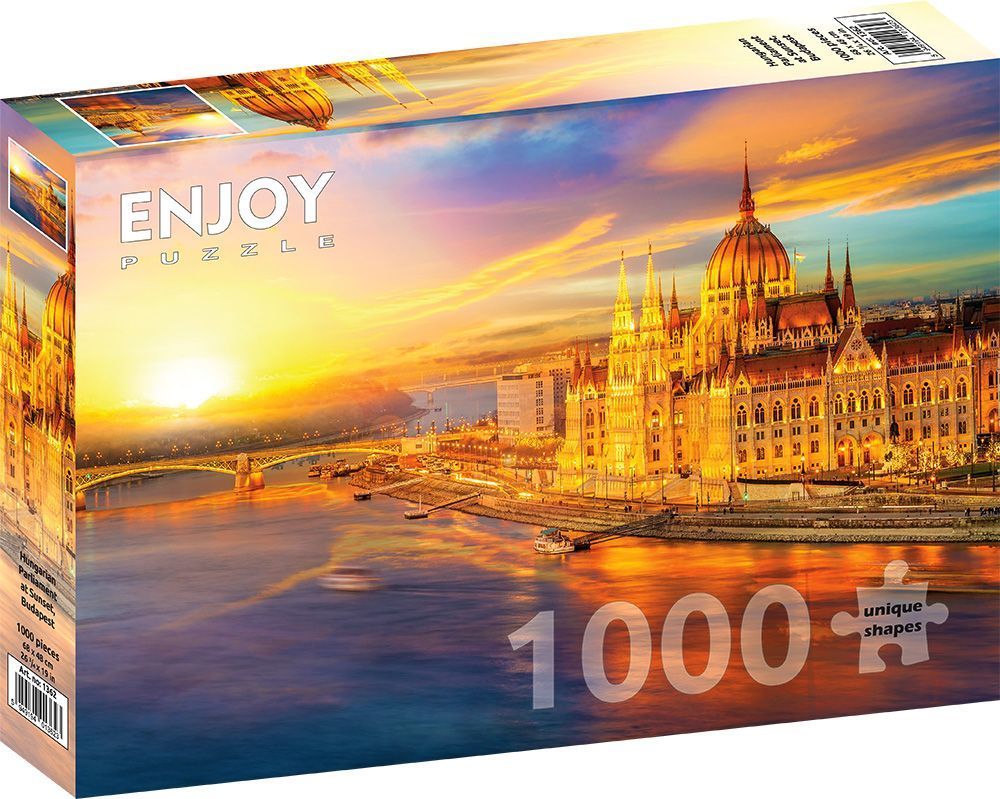 The Hungarian Parliament Building in Budapest illuminated by a vibrant sunset over the Danube River.