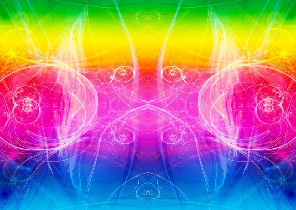 Symmetrical abstract fractal art with a vibrant rainbow gradient background.