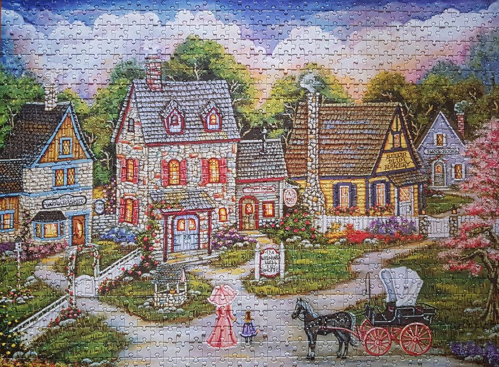 An idyllic village street scene with stone cottages, a horse-drawn carriage, and a woman and child walking.