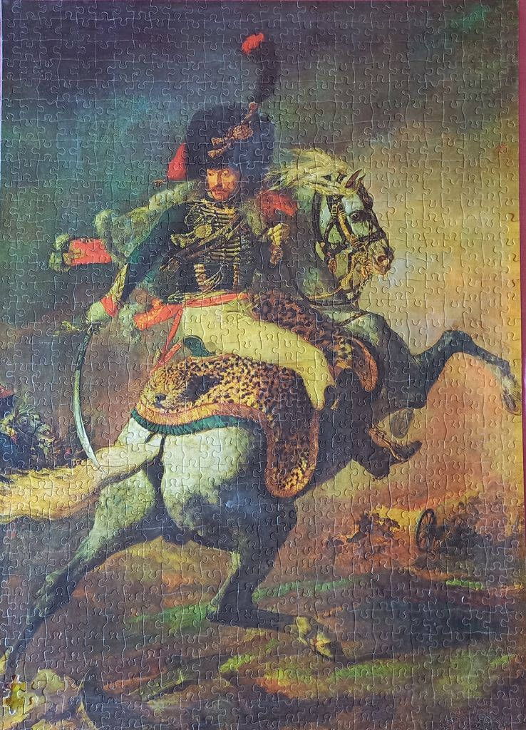 A historical oil painting of a French Napoleonic cavalry officer riding a horse into battle.