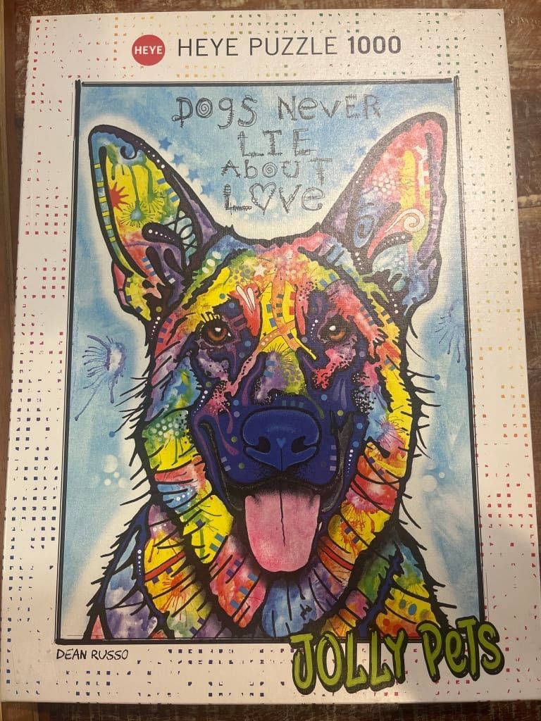 Colorful pop art portrait of a German Shepherd dog with the text "Dogs never lie about love."
