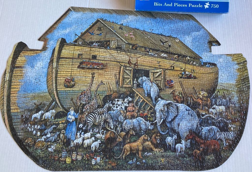An illustration of Noah's Ark filled with diverse animals and a bearded man standing in front.