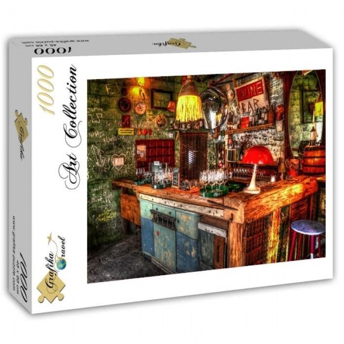 Interior view of a rustic, graffiti-covered wine bar with warm lighting and a wooden counter.