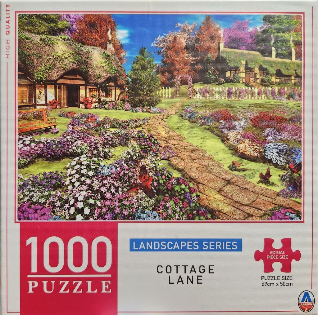 Idyllic cottage with a thatched roof, surrounded by a vibrant flower garden and a stone path under a blue sky.