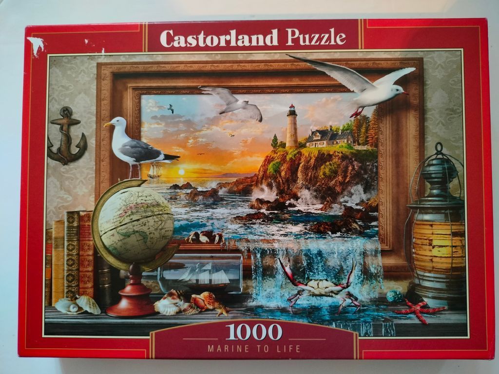 A coastal lighthouse scene emerging from a framed picture, with nautical objects like a globe, anchor, and crabs nearby.