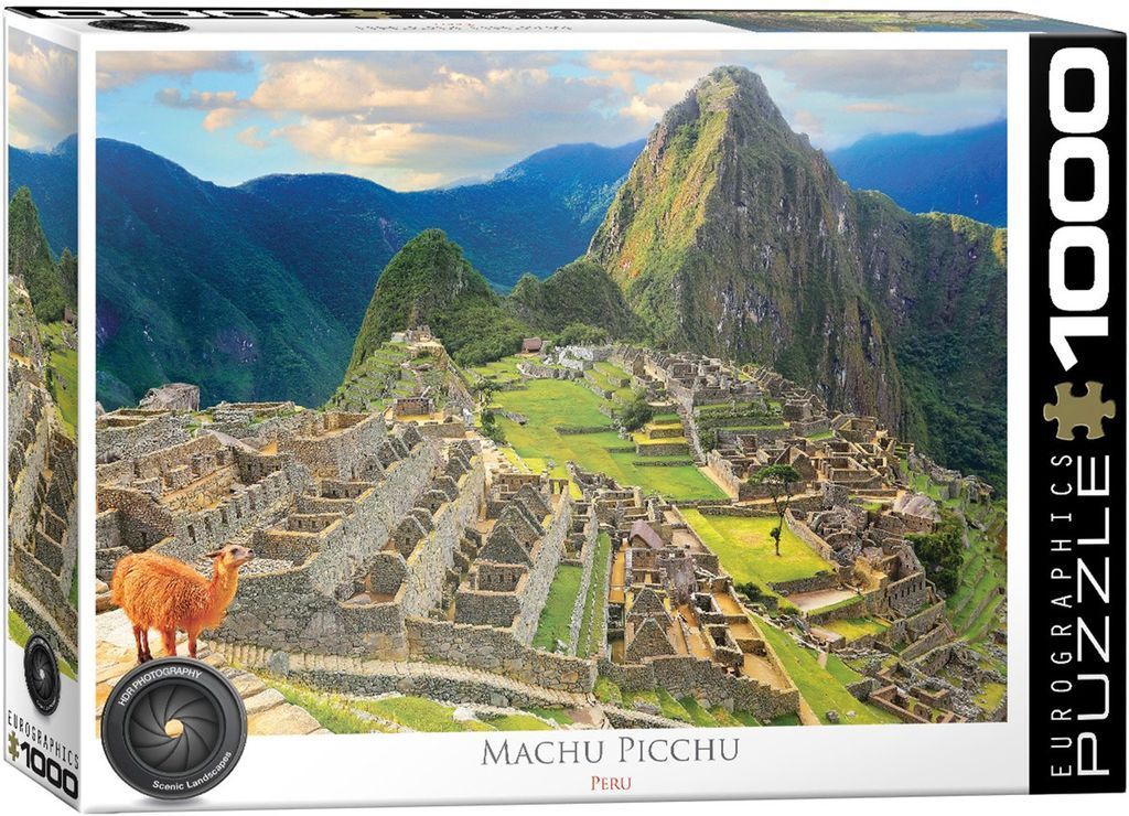 A panoramic photograph of the ancient ruins of Machu Picchu in Peru with a llama in the foreground.