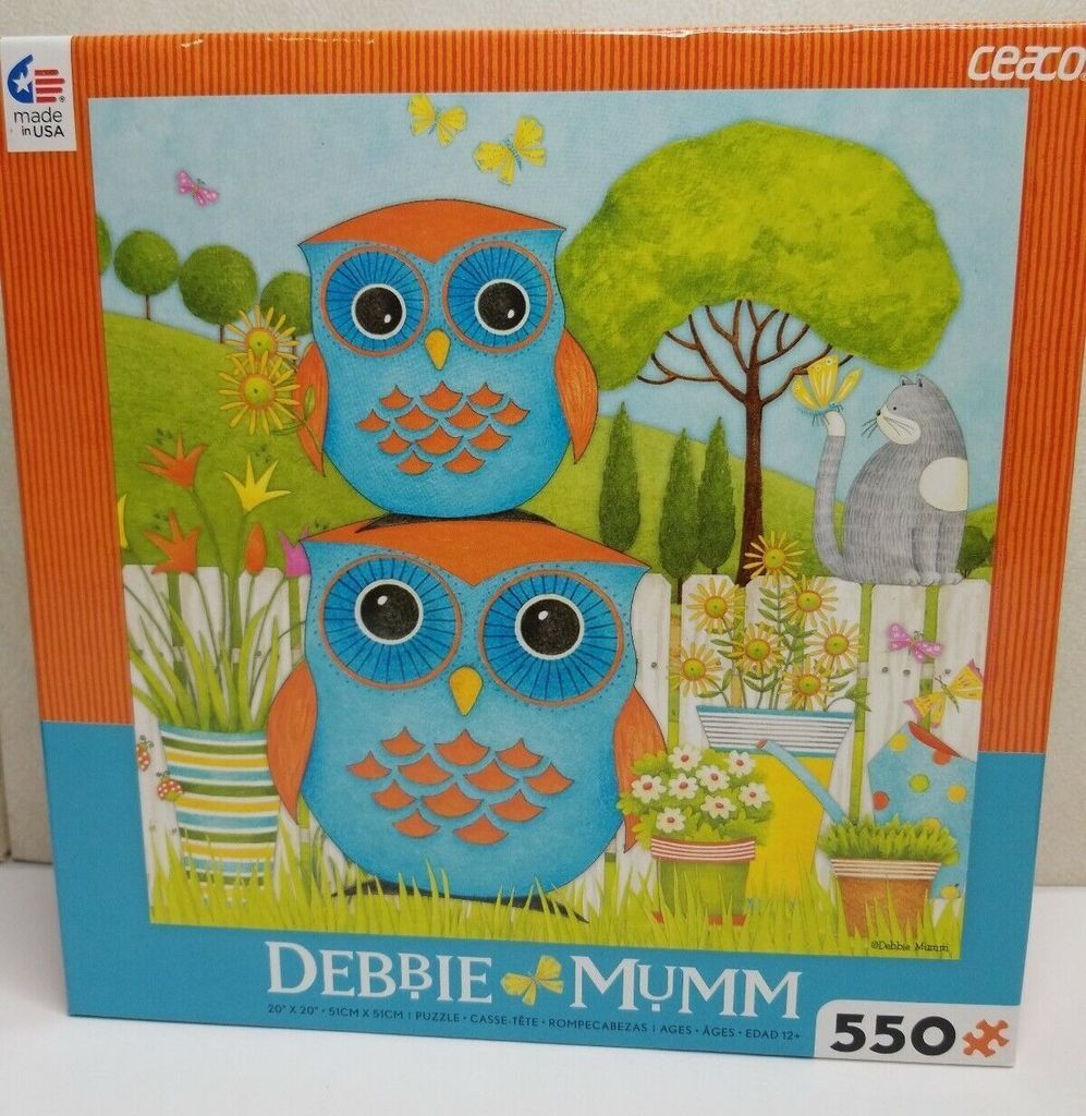Illustration of two stacked blue owls in a vibrant, whimsical garden with flowers, butterflies, and a cat.