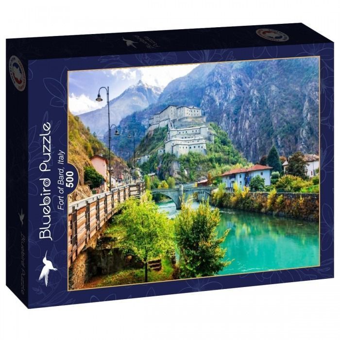 A panoramic photograph of the historic Fort of Bard in Italy, perched on a mountain overlooking a river and bridge.