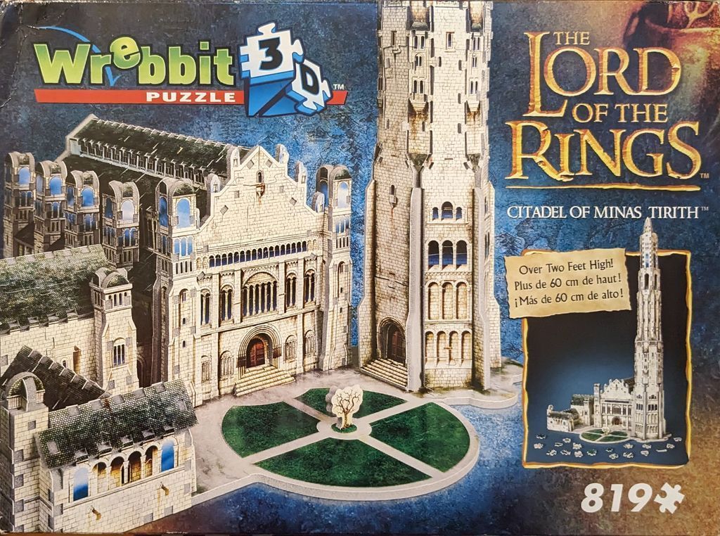 The Citadel of Minas Tirith from The Lord of the Rings featuring a tall white tower, stone buildings, and a central tree.