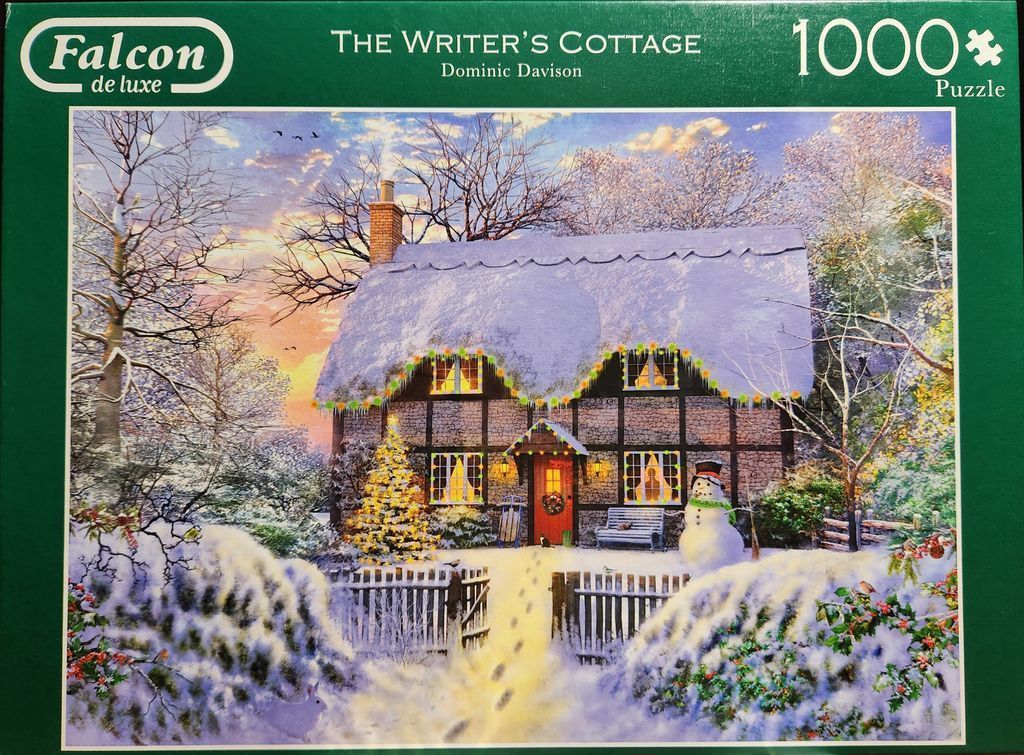 A snow-covered, timber-framed cottage at sunset with a decorated tree, snowman, and snowy garden path.