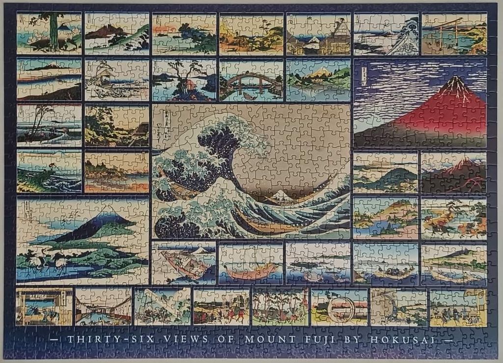 A montage of traditional Japanese woodblock prints depicting Mount Fuji from various perspectives.