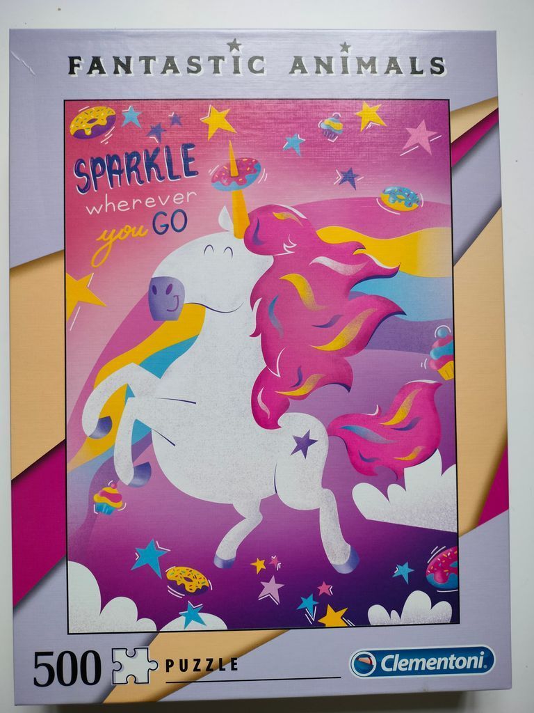 Cartoon illustration of a white unicorn with a pink mane and donut horn against a vibrant, star-filled purple background.