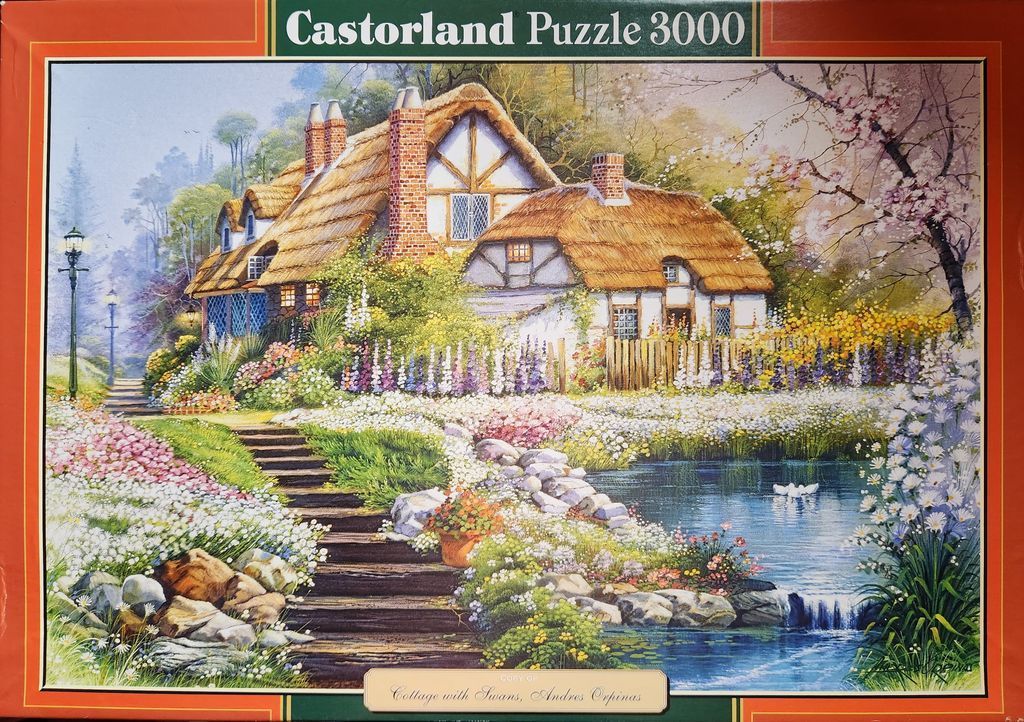 A charming thatched-roof English cottage surrounded by lush gardens, flowers, and a small pond with swans.