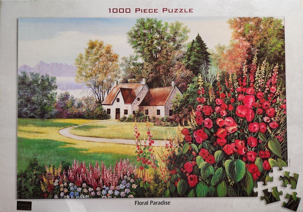 A peaceful cottage set in a vibrant garden with tall pink hollyhocks, lush trees, and distant mountains.