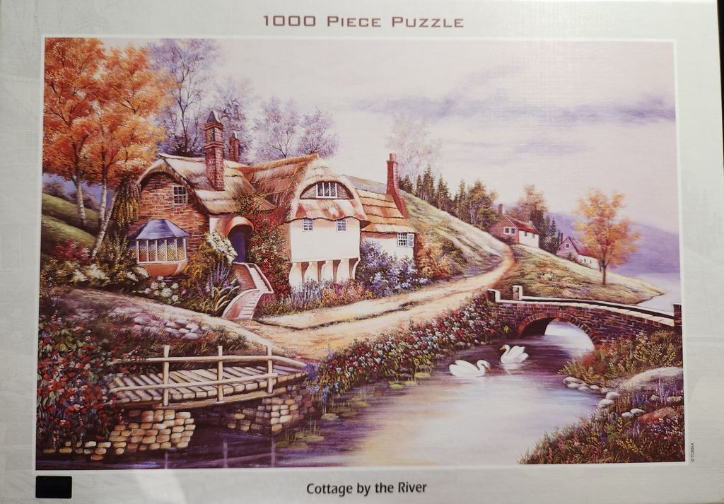 A peaceful cottage scene with a river, stone bridge, and swans in an autumn landscape.