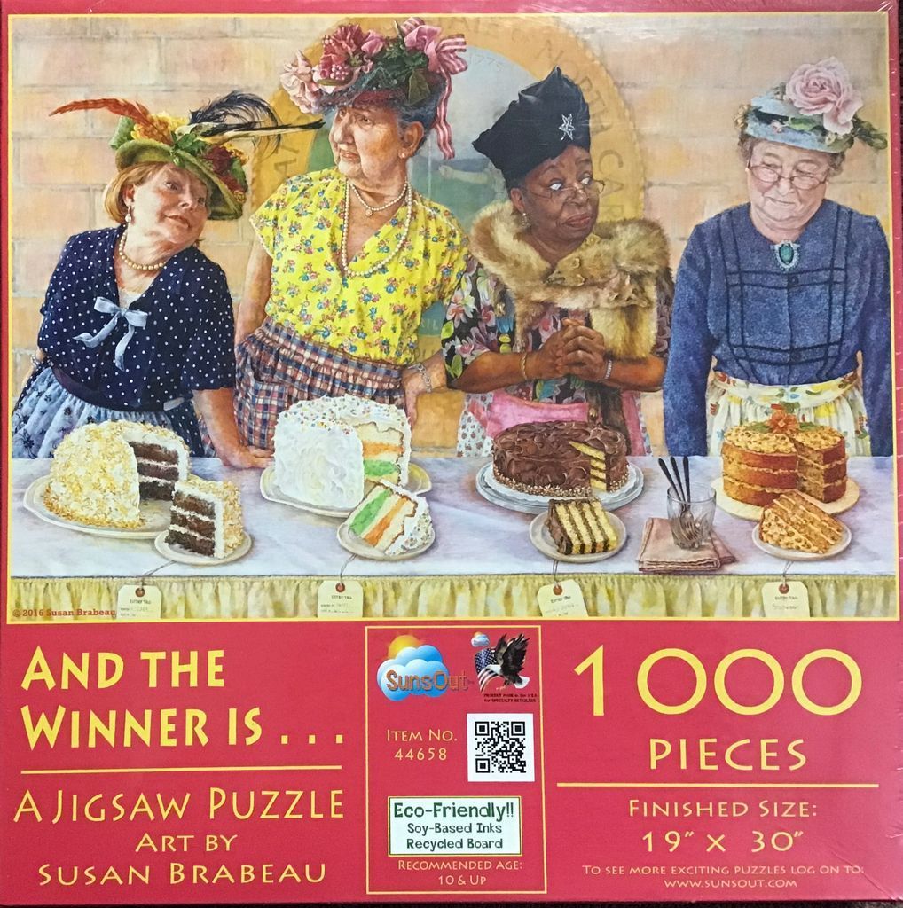 Four women in hats standing behind a table with four different layer cakes at a competition.