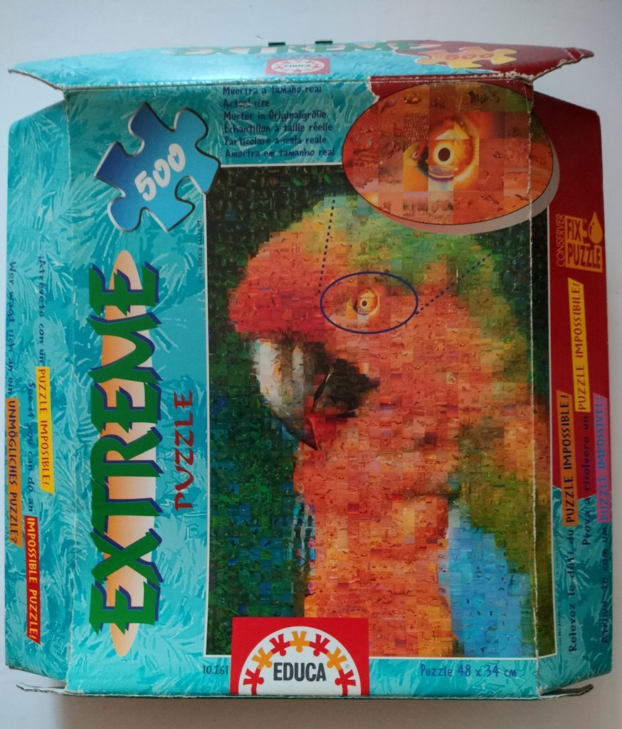 A photo mosaic of a macaw parrot made up of hundreds of tiny individual images.