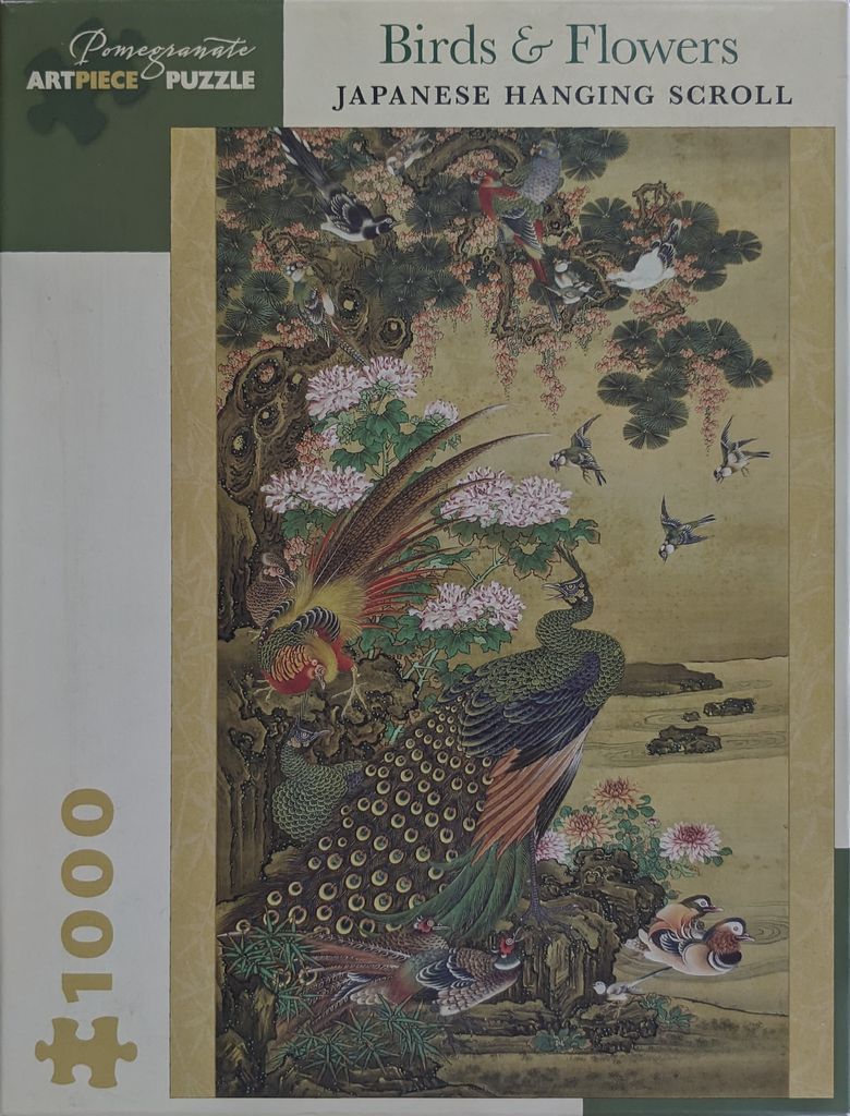 Japanese hanging scroll painting featuring a peacock, pheasants, and various smaller birds amidst flowers and pine trees.