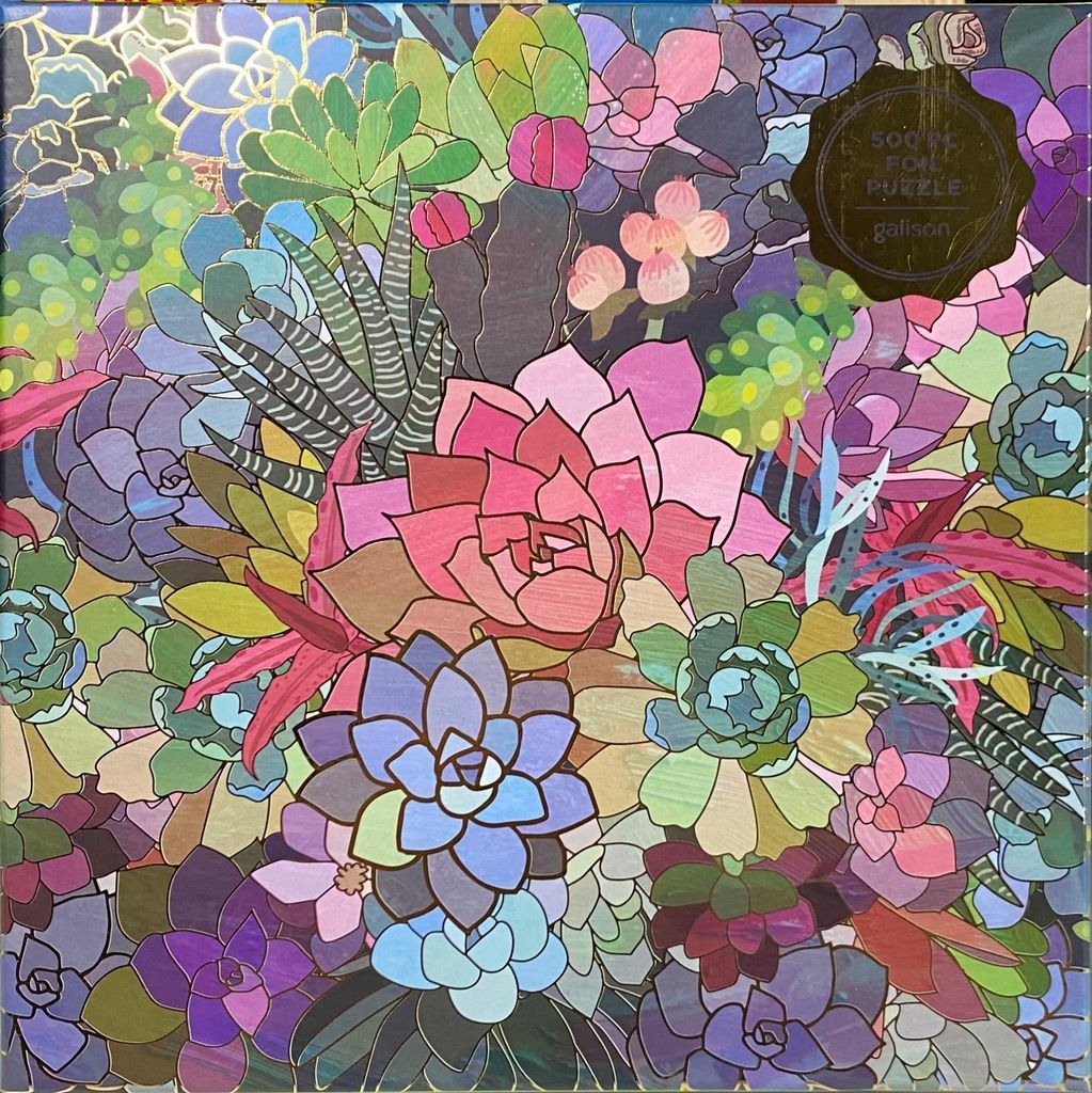 A dense illustration of various succulents in shades of pink, purple, green, and blue with gold foil accents.