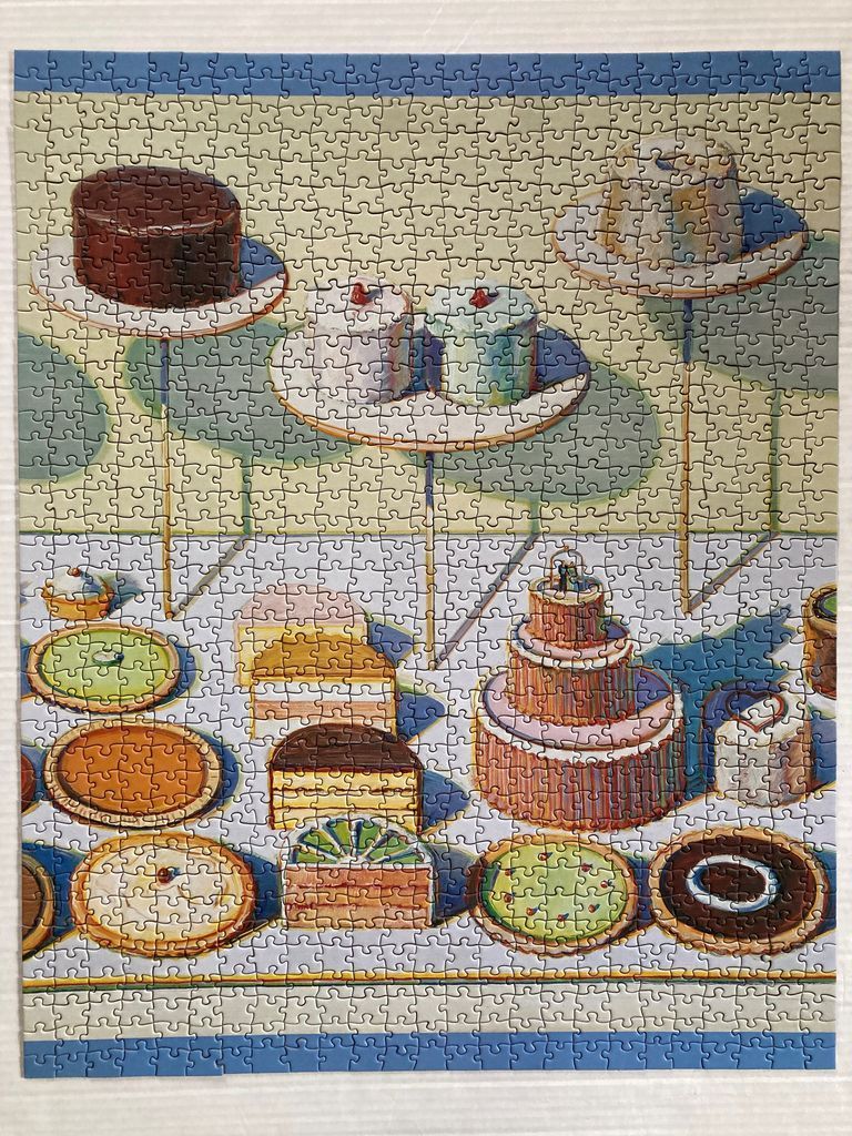 An illustration of various cakes and tarts arranged on pedestals and a table surface.