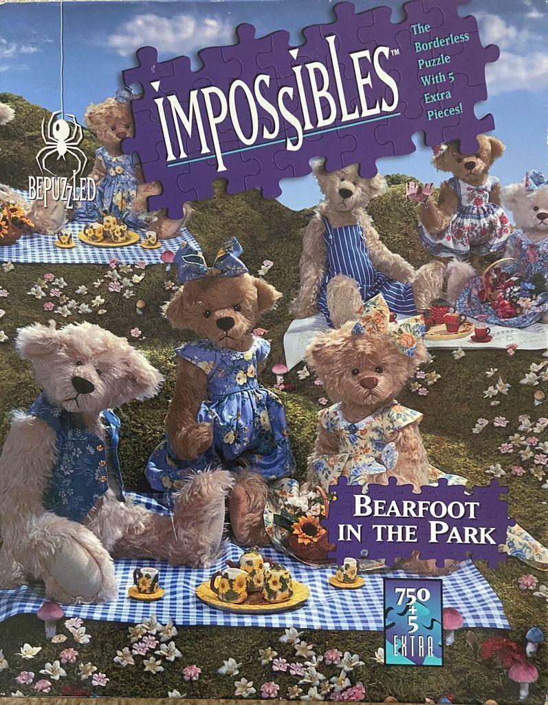 A group of teddy bears in a grassy meadow, dressed in blue outfits and sitting on gingham picnic blankets.