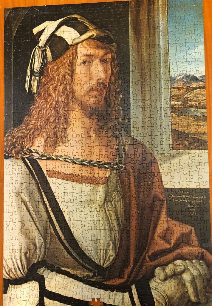 Portrait of a long-haired man in Renaissance attire, modeled after Albrecht Durer's self-portrait.