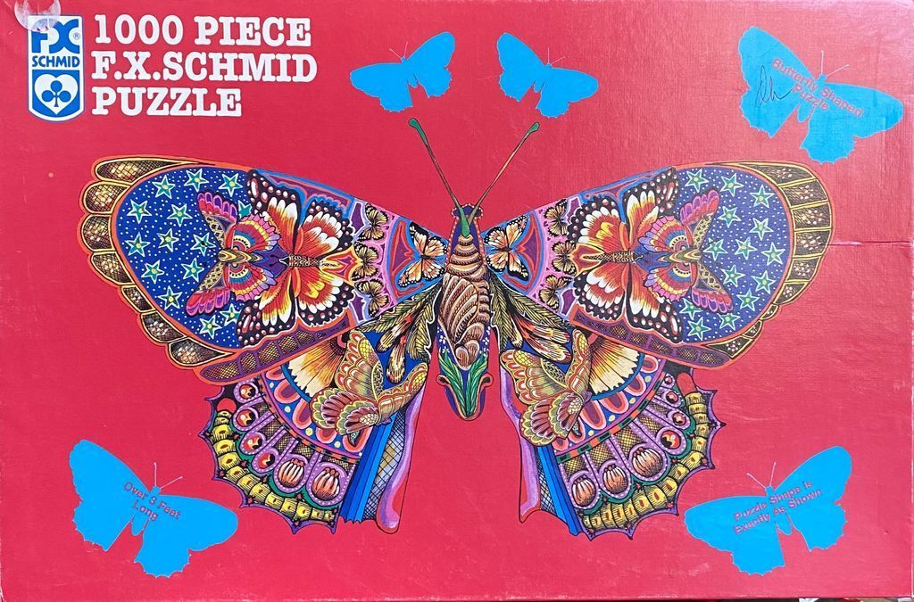 Intricate, psychedelic butterfly illustration on a vibrant red background.