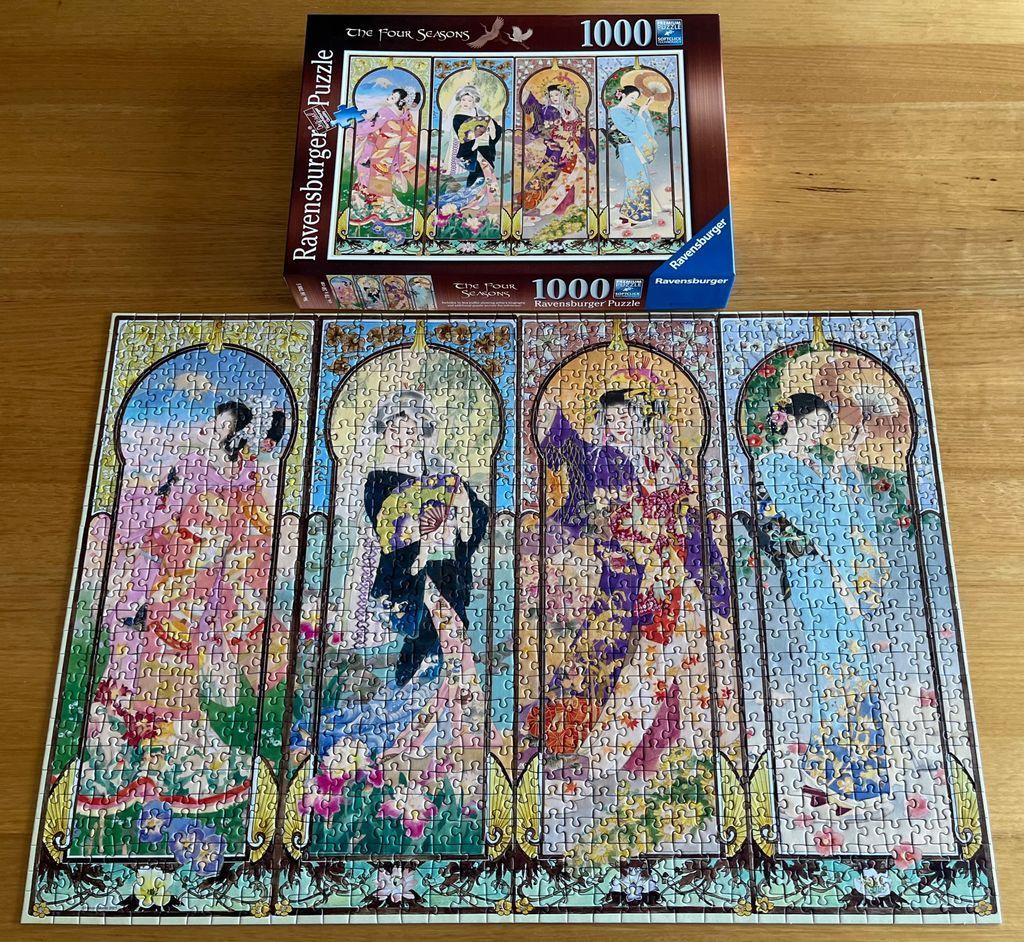 Four art-nouveau style panels depicting women in kimonos representing the four seasons.