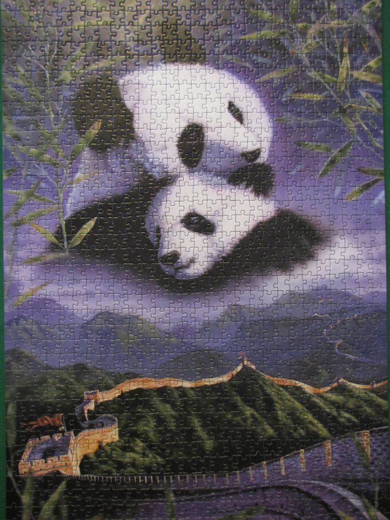 Two pandas nestled together floating in a purple mist above a mountainous landscape with the Great Wall of China.