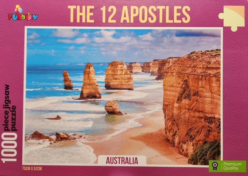 A scenic photograph of the Twelve Apostles limestone stacks along the Australian coastline under a bright blue sky.