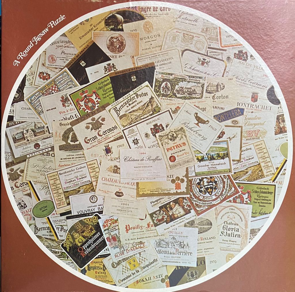 A circular collage of various vintage European wine labels layered over each other.