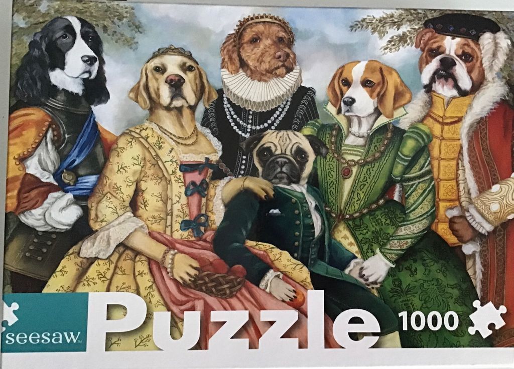 A group portrait of five dogs dressed in Renaissance-era royal attire.
