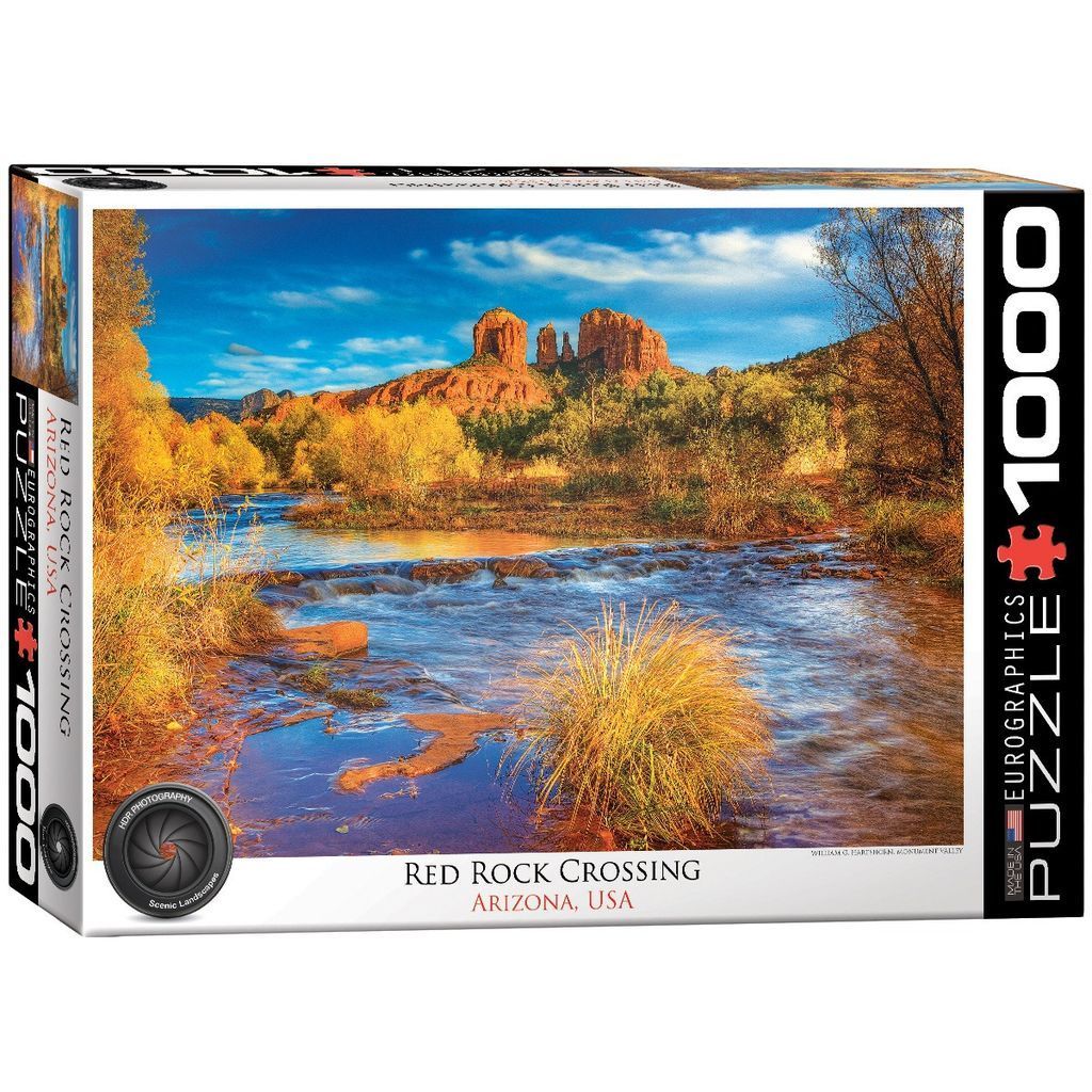 Scenic landscape photograph of Cathedral Rock in Sedona, Arizona, towering over a flowing creek with autumn foliage.