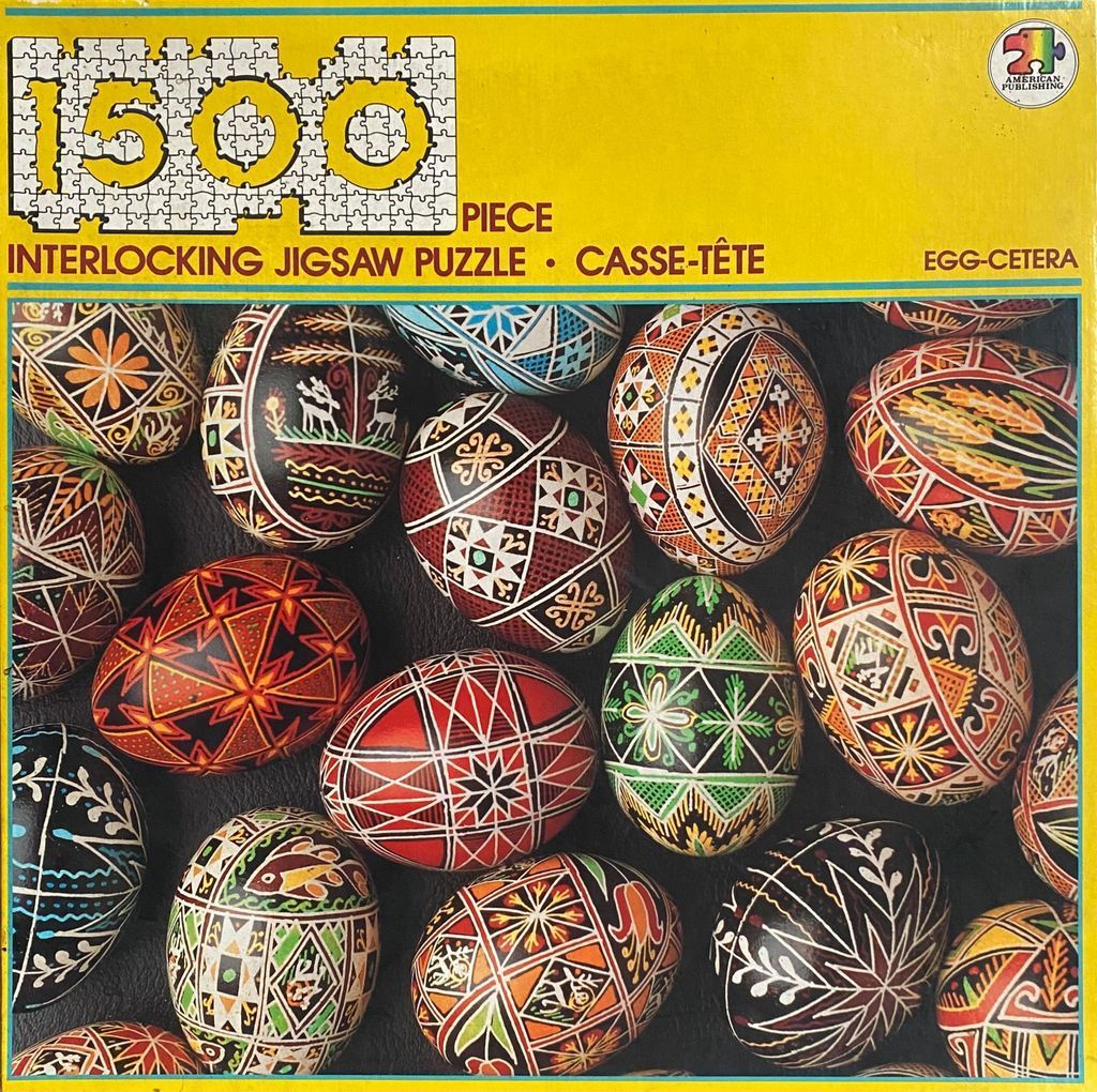 A collection of intricately decorated traditional Pysanka Easter eggs against a dark background.